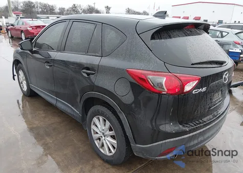 2013 Mazda Cx-5 Touring z USA, uszkodzony, nr VIN JM3KE2CE5D0161308